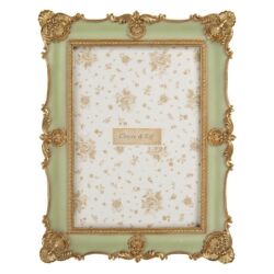 Zöld képkeret barokkos arany színű díszítéssel