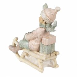 Rózsaszín ruhás kisfiú szánon - 10x5x10cm - Karácsonyi dekoráció