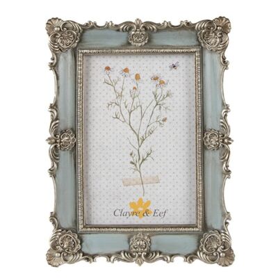 Világoskék képkeret ezüstös díszítéssel