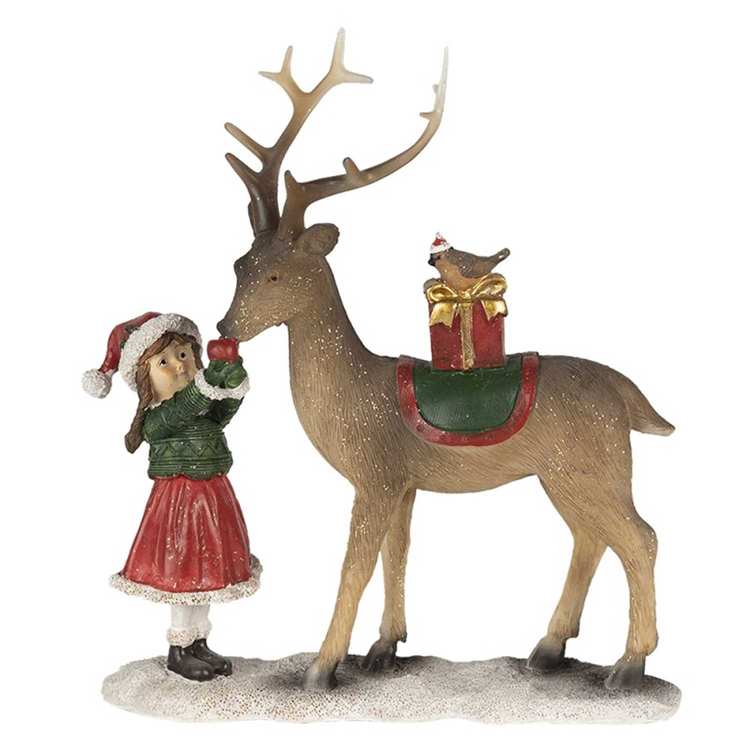 Rénszarvast etető kislány, karácsonyi dekoráció