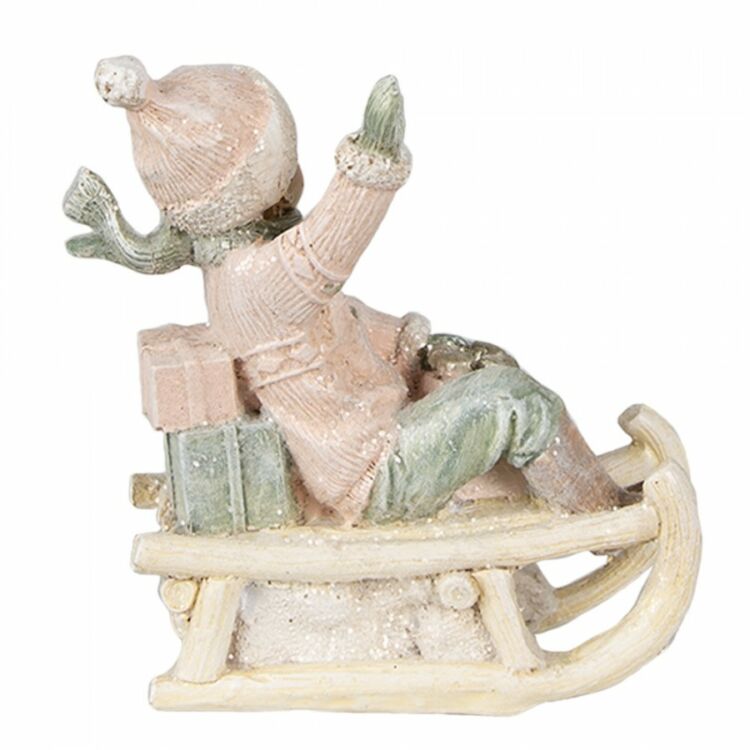 Rózsaszín ruhás kisfiú szánon - 10x5x10cm - Karácsonyi dekoráció